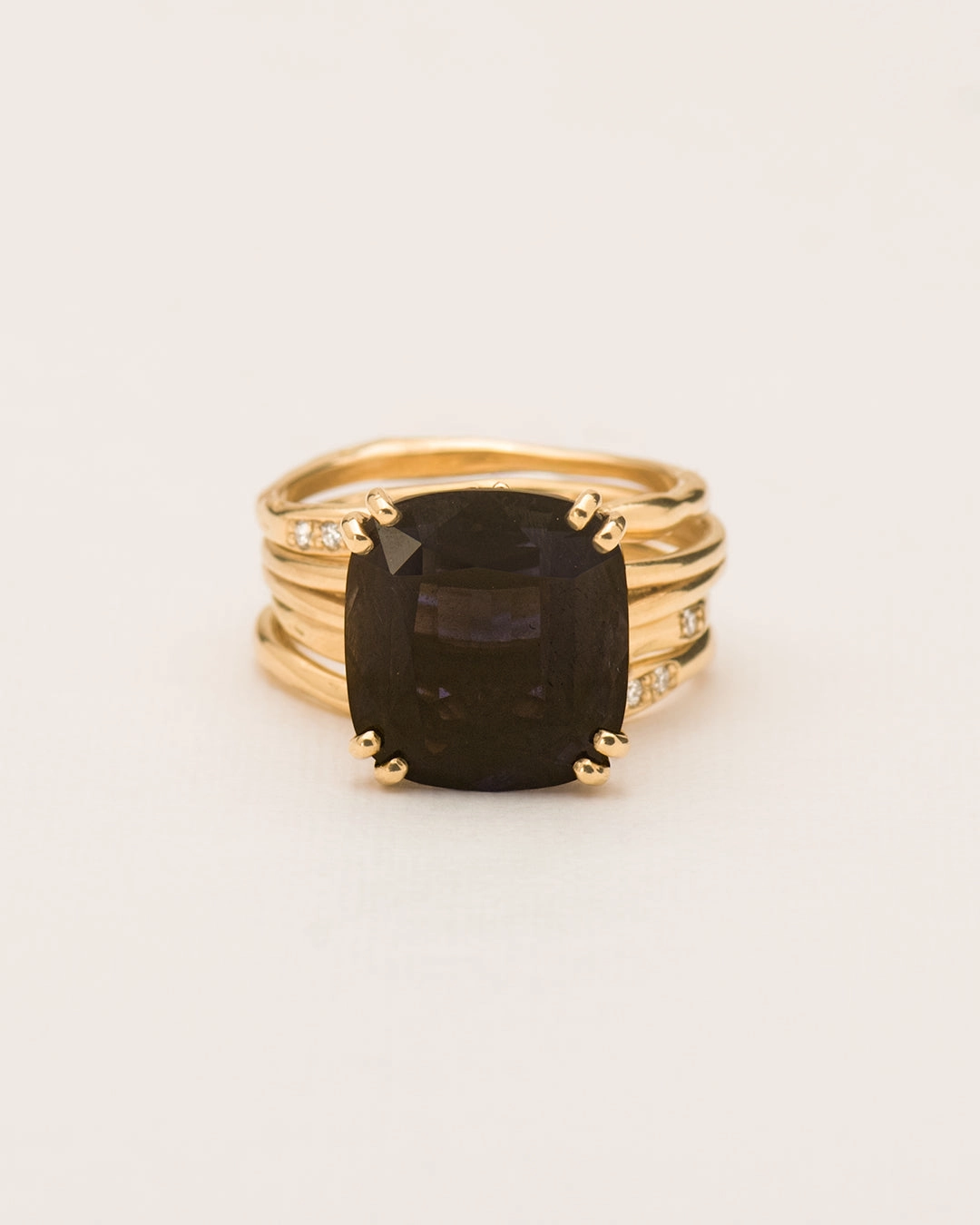 Iolite cocktail ring   set of three stacked organic rings with white diamonds in 18 ct. gold