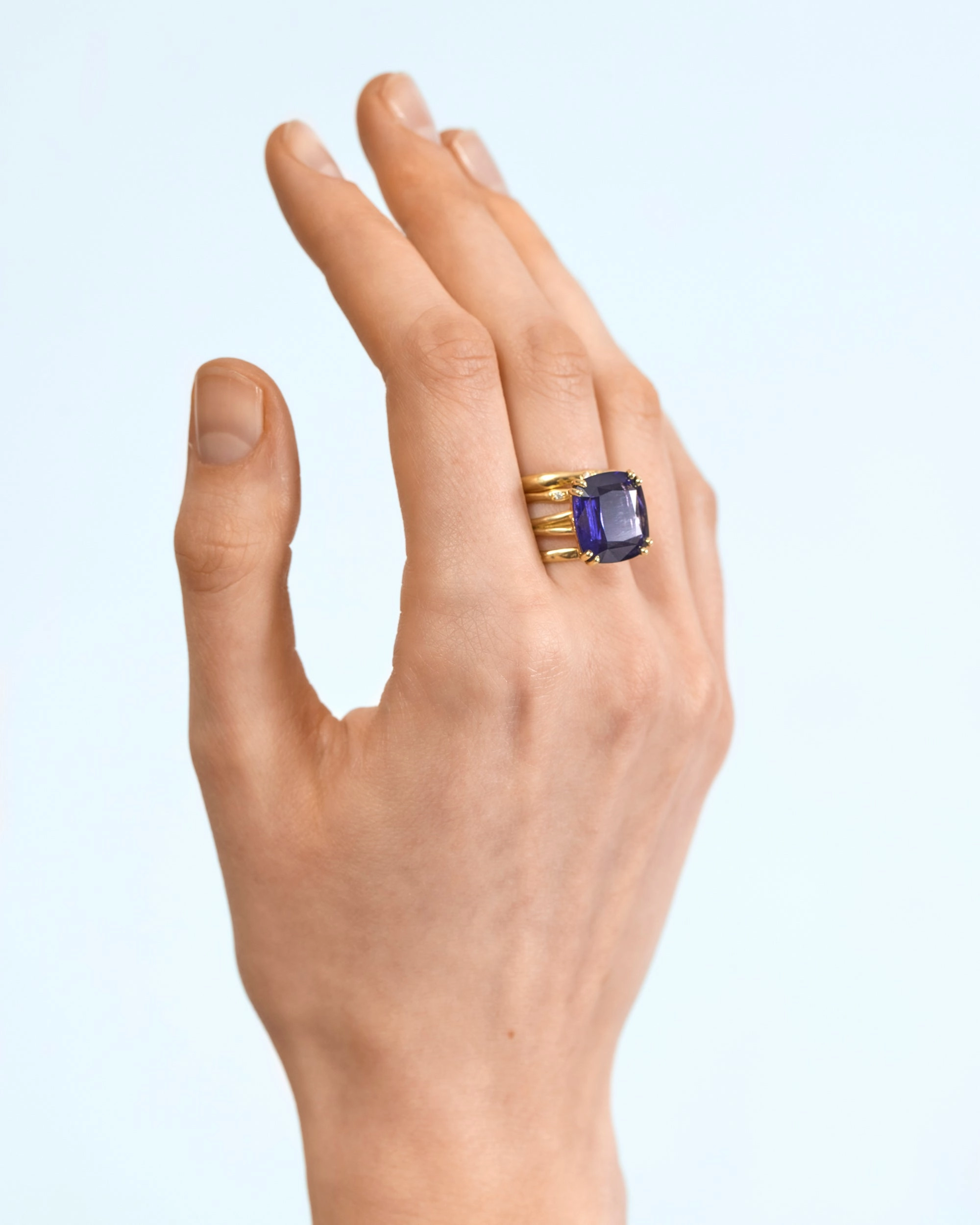 Iolite cocktail ring   set of three stacked organic rings with white diamonds in 18 ct. gold